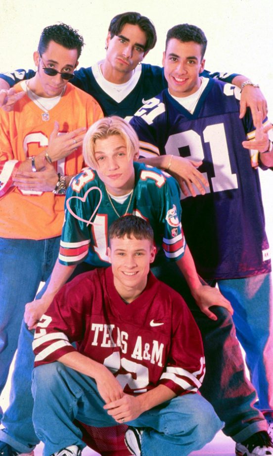 Nick Carter: Backstreet Boys Pose In Sports Jerseys For A Band Snap, 1999
