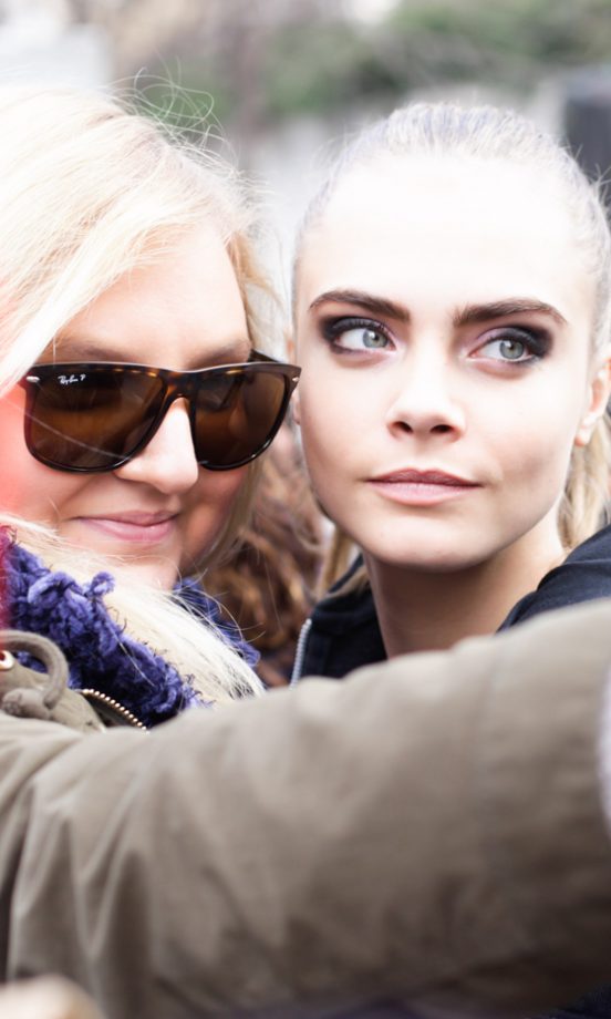 Cara Delevingne Taking Snaps With Fans At Mercedes-Benz Fashion Week In New York, 2013