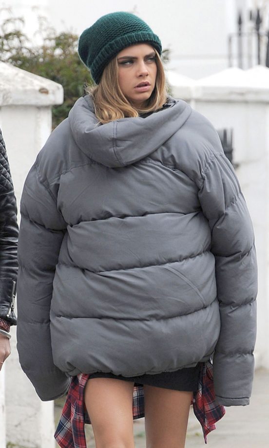 Cara Delevingne Keeps Warm In A Puffa Jacket On A Shoot In London, 2013