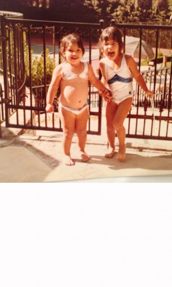 Kim Kardashian And Sister Kourtney Giggle In Their Swimmers