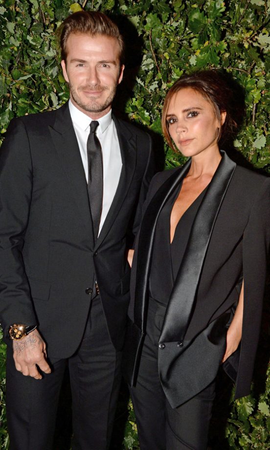 David And Victoria Beckham At London Fashion Week, 2013