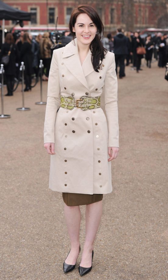 Michelle Dockery Nips In Her Coat With A Belt At The Burberry Prorsum Show At London Fashion Week SS12, 2011