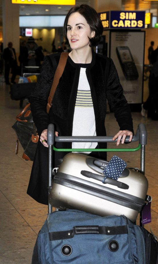 Michelle Dockery Touches Down At Heathrow Airport, 2013