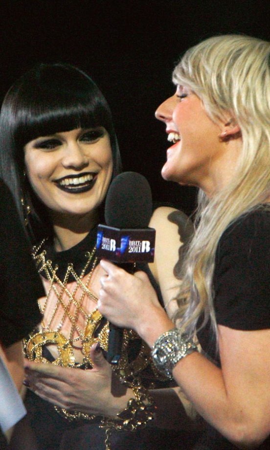 Jessie J and Ellie Goulding Have A Giggle Backstage At The Brit Awards 2011