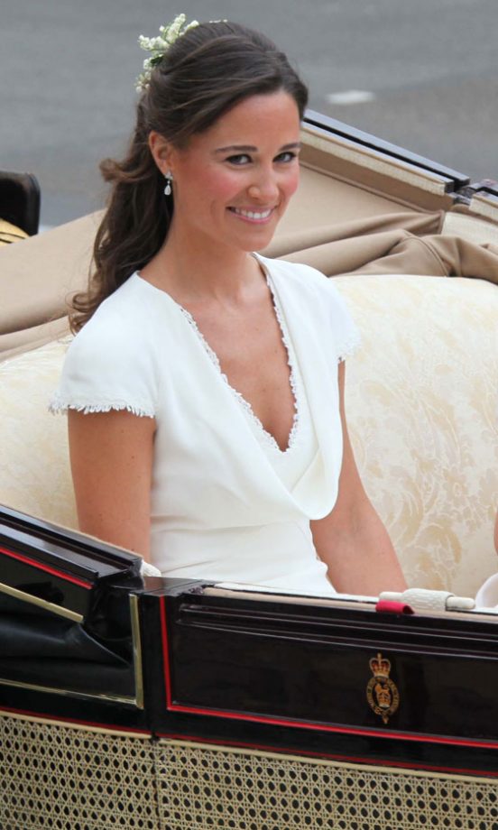 Royal Maid Of Honour Pippa Middleton Gives A Big Grin To The Crowd As She Arrives At Buckingham Palace In A Horse Drawn Carriage, 2011