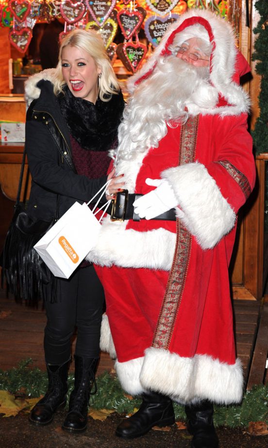 Amelia Lily Snuggles Up To Father Christmas At Winter Wonderland In London, 2013
