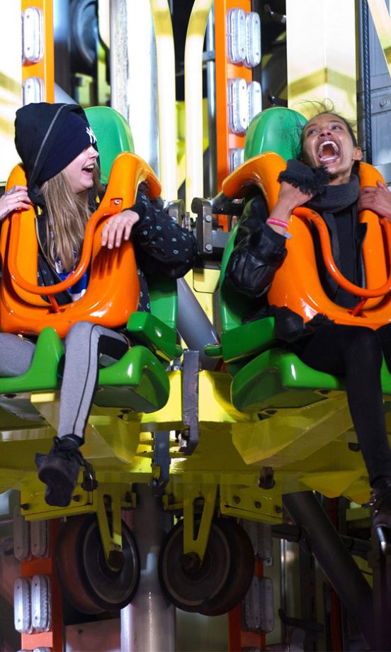 Cara Delevingne And Her Pal Get The Giggles At Winter Wonderland In London, 2013