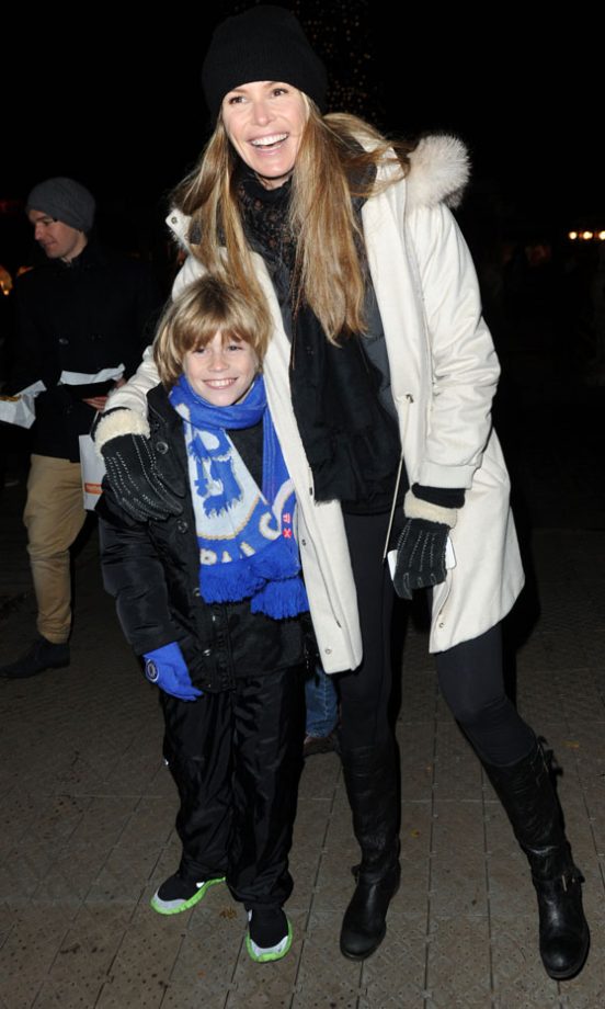 Elle Macpherson Stays Warm With Her Son At Winter Wonderland In London, 2013