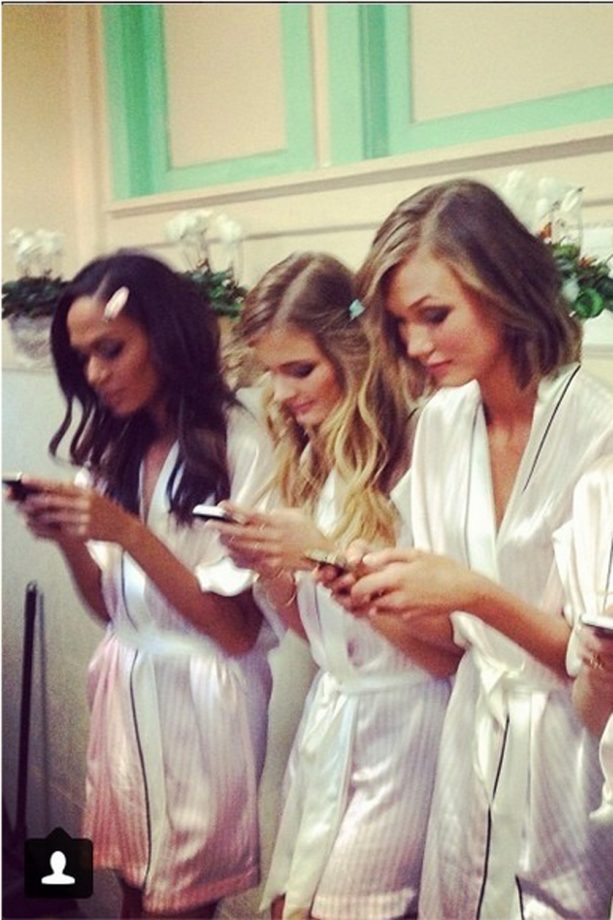 Constance Shares A Snap Of Karlie Kloss, Candice Swanepoel And Joan Smalls Busy On Their Phones