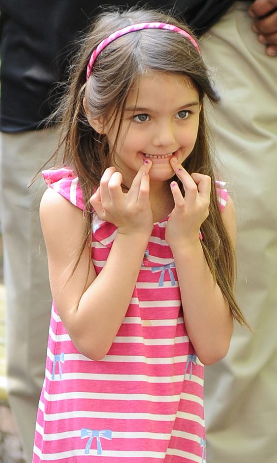 Suri Cruise: She's As Sweet As They Come In Candy Cane Pink And White Stripes, 2012