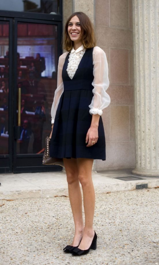 Alexa Chung Looks Pretty In A White Shirt And Black Dress At Paris Fashion Week, October 2011