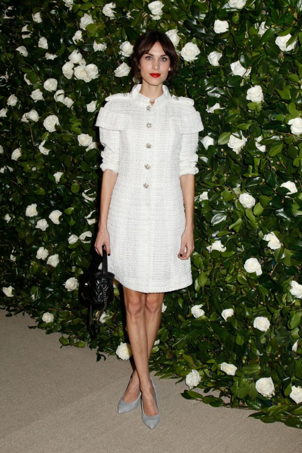 Alexa Chung Looks Classicly Beautiful In A White Vintage-Look Dress