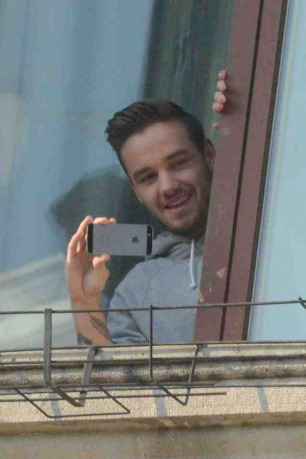 Liam Payne Turns The Tables On His Fans As He Takes Snaps From His Hotel Balcony