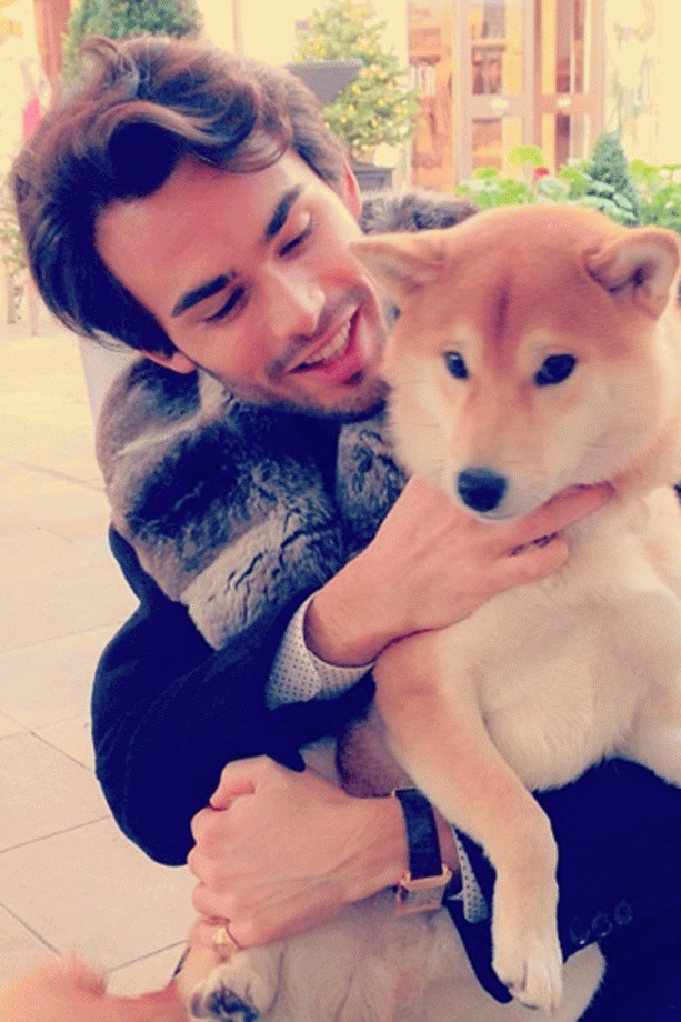 Mark Francis Cuddles Up To A Super-Cute Pup, 2013