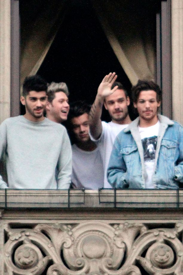 One Direction Greet Fans From A Hotel Balcony In Milan