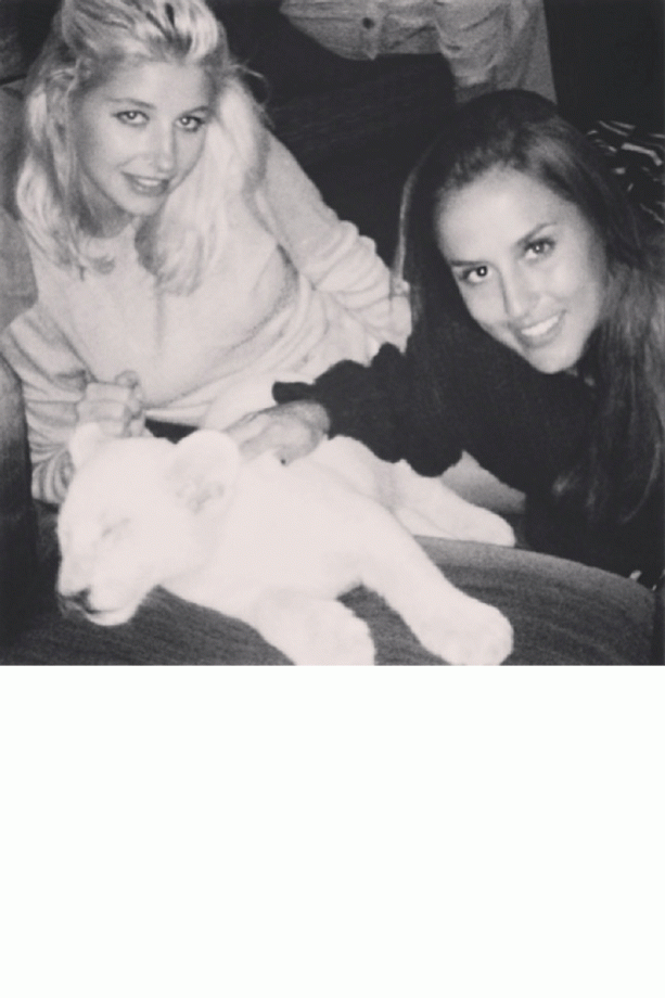 Pheobe Lettice And Lucy Watson Stroke Their Exotic New Pet In South Africa, 2013