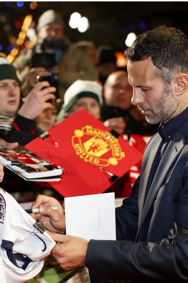 Ryan Giggs Signs Man U Fan Memorabelia At 'The Class of '92 Film Premiere'