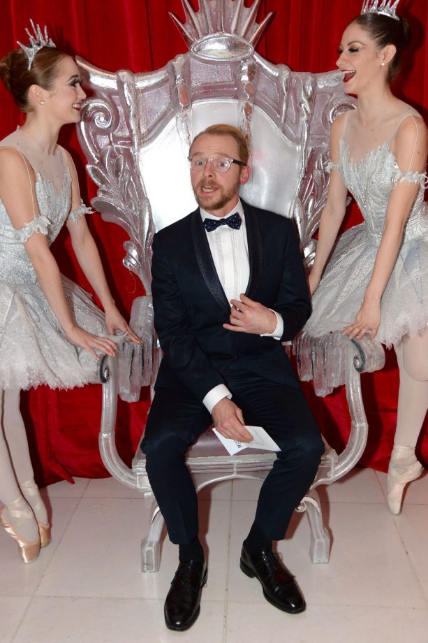 Simon Pegg Poses With A Couple Of Dancers At The English National Ballet Christmas Party