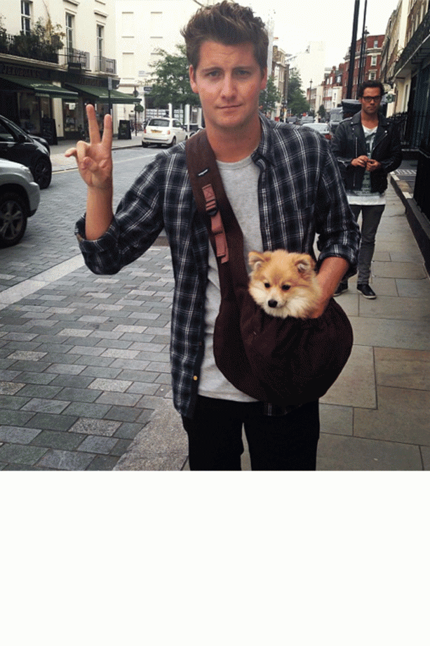 Stevie Johnson Carries His Cute New Accessory Around London, 2013