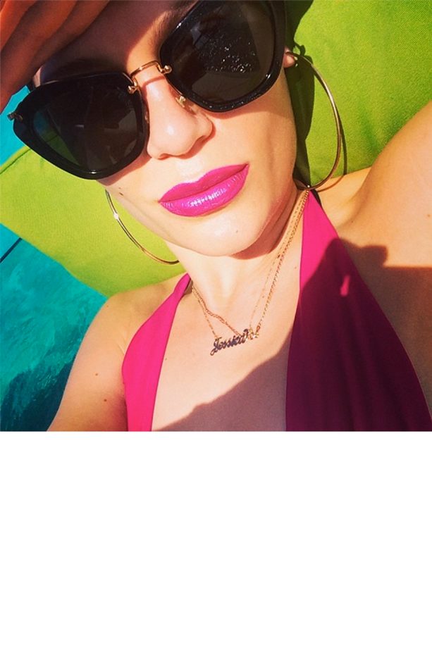 Jessie J Opts For A Hot Pink Look As She Relaxes On A Sun Lounger