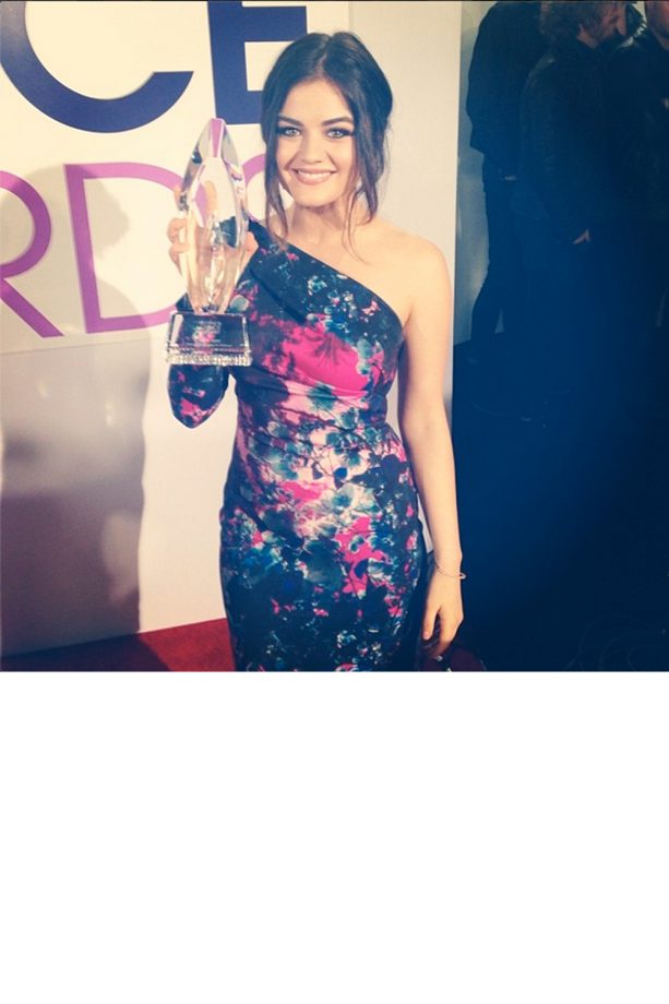 Lucy Hale Grins As She Shows Off Her Award