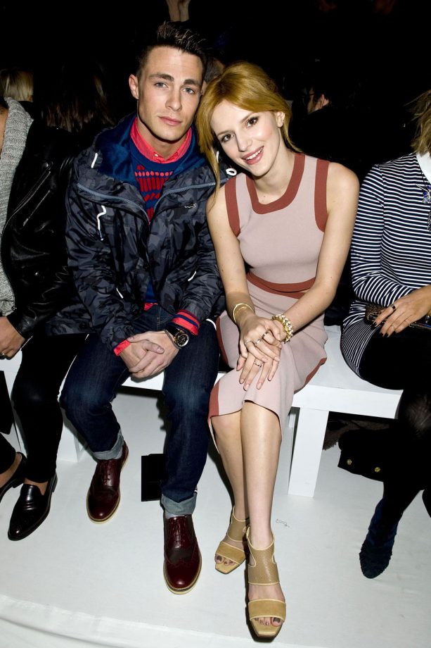 Colton Haynes And Bella ThThorne At New York Fashion Week AW14