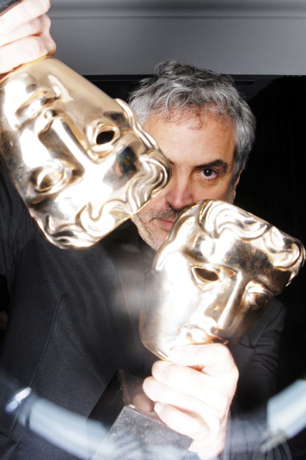 Alfonso Cuaron Shows Off His BAFTA Awards