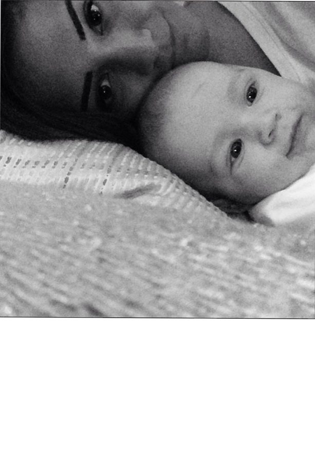 Frankie Sandford Cuddles Up To Baby Parker At Home, 2014