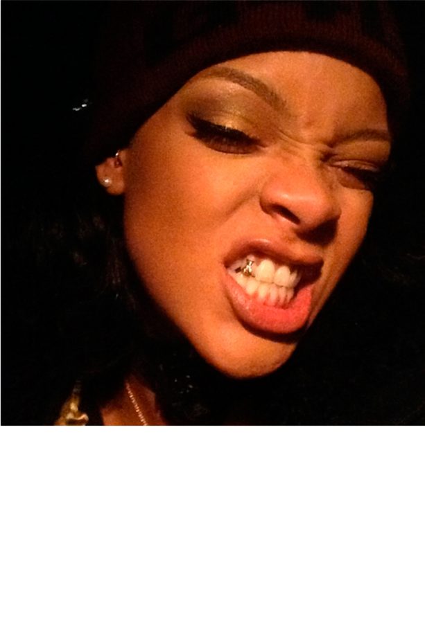 Rihanna Swaps Her Grills For A Gold Tooth Gem, 2014