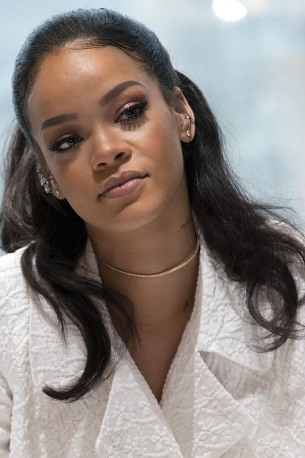 Rihanna Sports A Half-Up Hairdo At A Photocall In New York, 2015