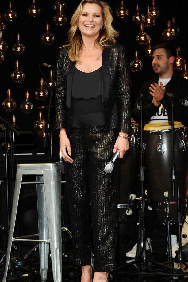 Kate Moss Takes To The Oxford Street Window At The Kate Moss Topshop X Launch Party, 2014