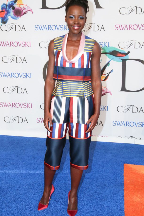 Lupita Nyong'o Works The Red Carpet At The CFDA Fashion Awards, 2014