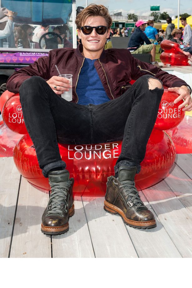 Oliver Cheshire Relaxes In The VIP area At V Festival, 2014