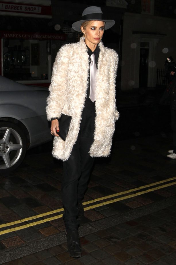 Laura Bailey Had Opted For A Cool Androgynous Look In A Shirt And Tie, Dressed UP Courtesy Of A Shaggy Fur Coat