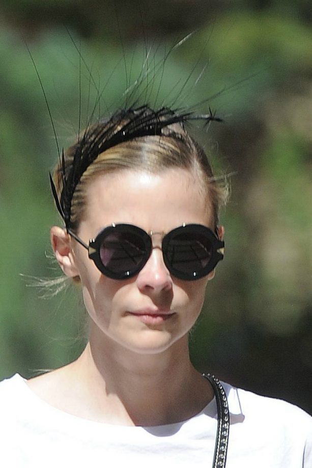 Jaime King Dresses Up A White Tee With A Statement Black Headpiece