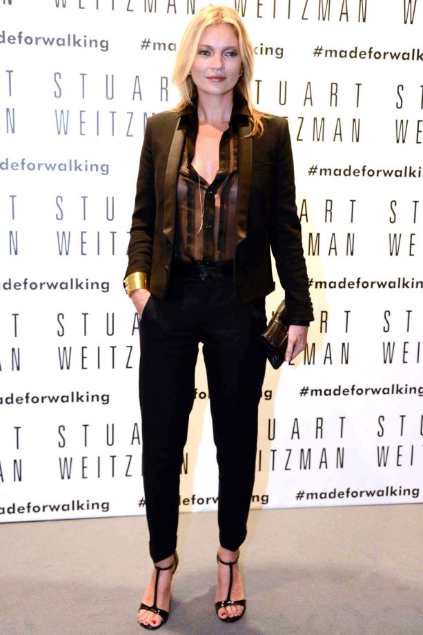 Kate Moss Teams A Sheer Shirt With A Tailored Trouser Suit At The Stuart Weitzman Boutique Opening In Italy, 2013