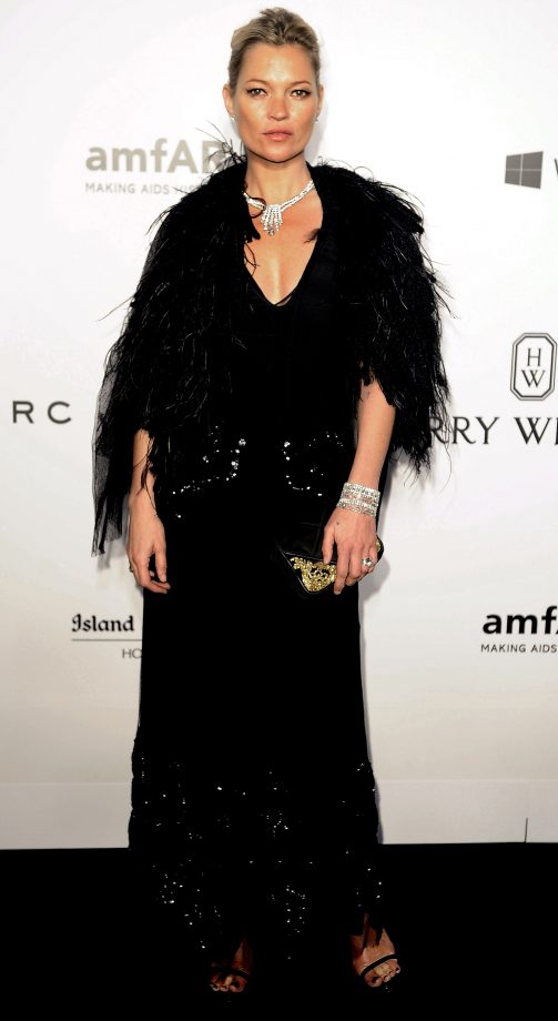 Kate Moss Wears A Feathered Cape and Sequin Maxi Dress, Hong Kong, 2015