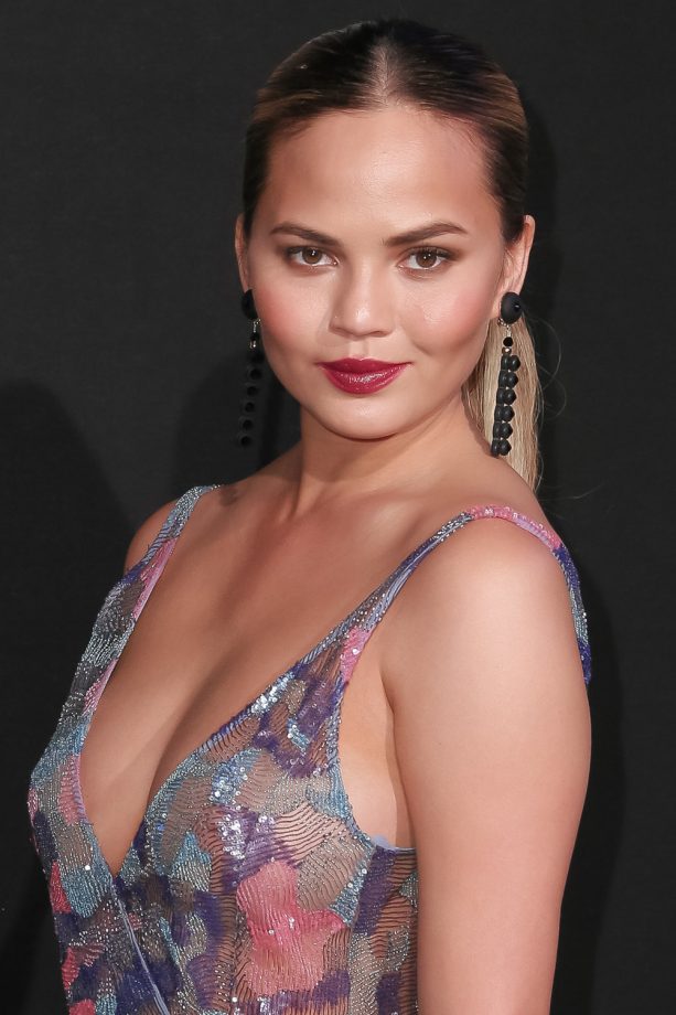 Chrissy Teigen's slicked-back pony at a Vogue party during Paris Couture Fashion Week, 2015