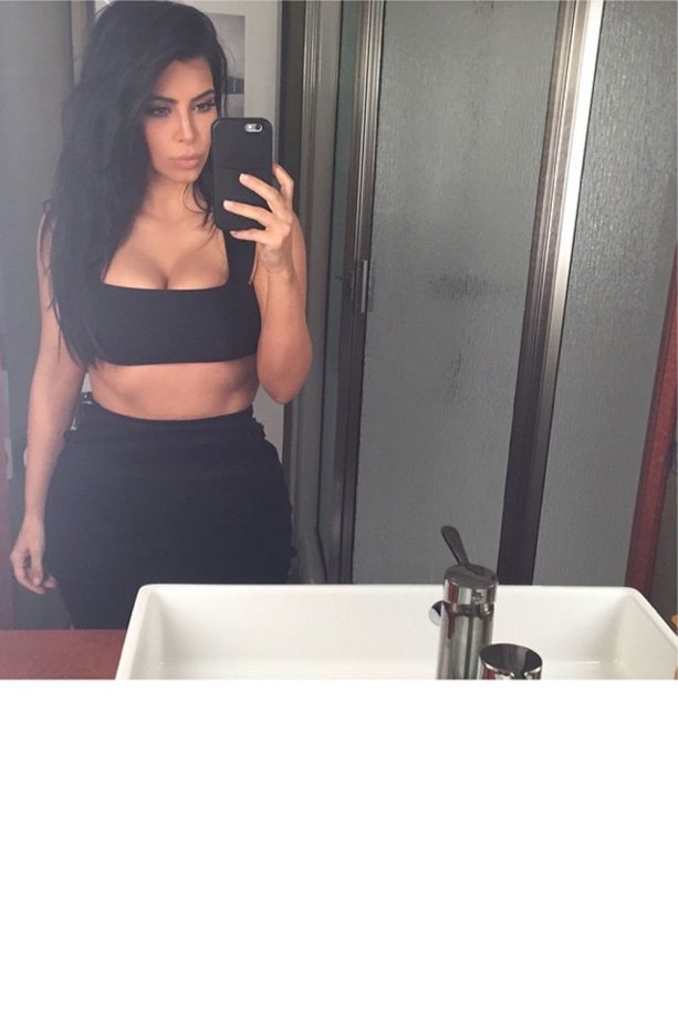 Kim Kardashian Snaps A Quick Selfie Before Partying At The Pre-Super Bowl Concert, 2015