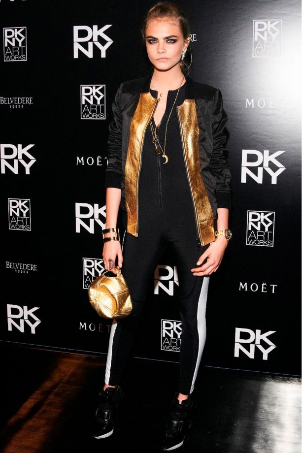 Cara Delevingne Goes For Gold Metallic At The DKNY Artworks Launch In London, 2013