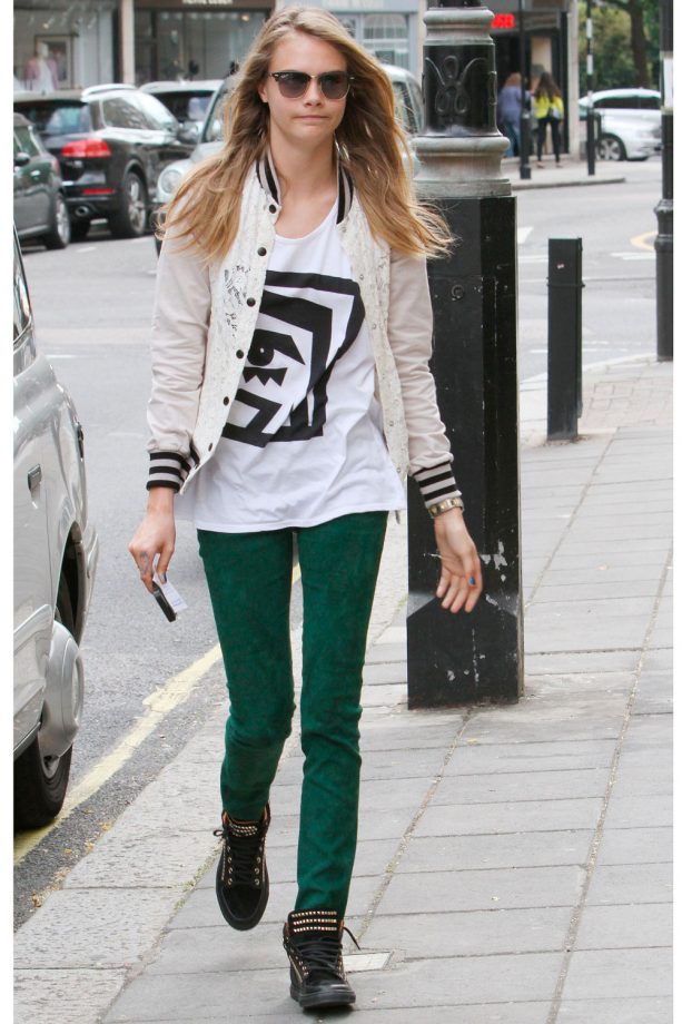 Cara Delevingne Rocks A White Bomber Jacket Out And About In London, 2013