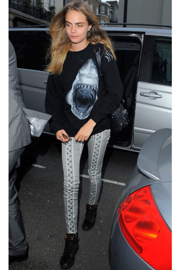 Cara Delevingne In A Shark Jumper And Aztec Print Trousers Out And About In London, 2013