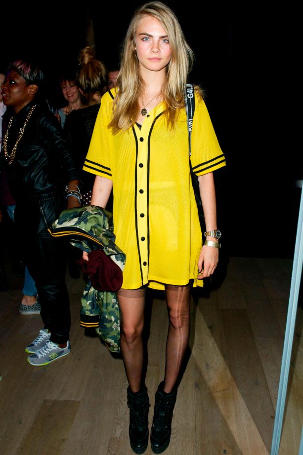 Cara Delevingne Stands Out In Yellow At Rihanna's River Island Launch Event In London, 2013