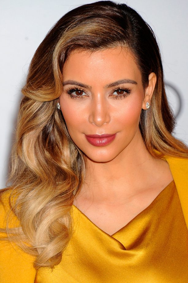 Kim Kardashian Tongs Her Locks Into Retro Curls