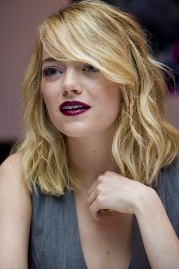 Emma Stone Tousles Her Highlighted Hair For The Amazing Spider-Man 2 Press Conference, 2013