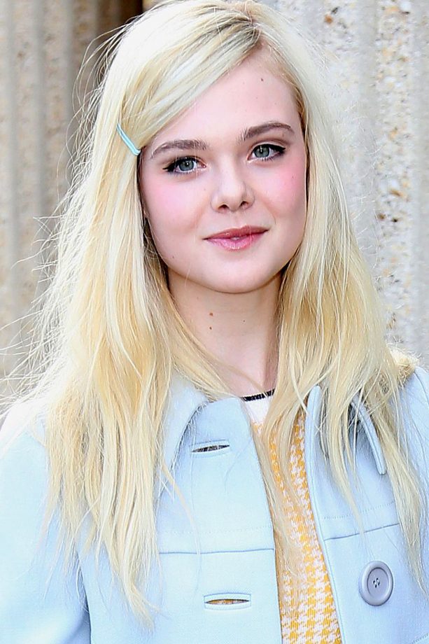 Elle Fanning Works A Cool Clip Into Backcombed Hair At Miu Miu's Show During Paris Fashion Week, 2014