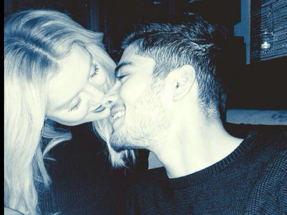 Zayn Malik And Perrie Edwards Celebrate Valentines Day With A Kiss, 2014