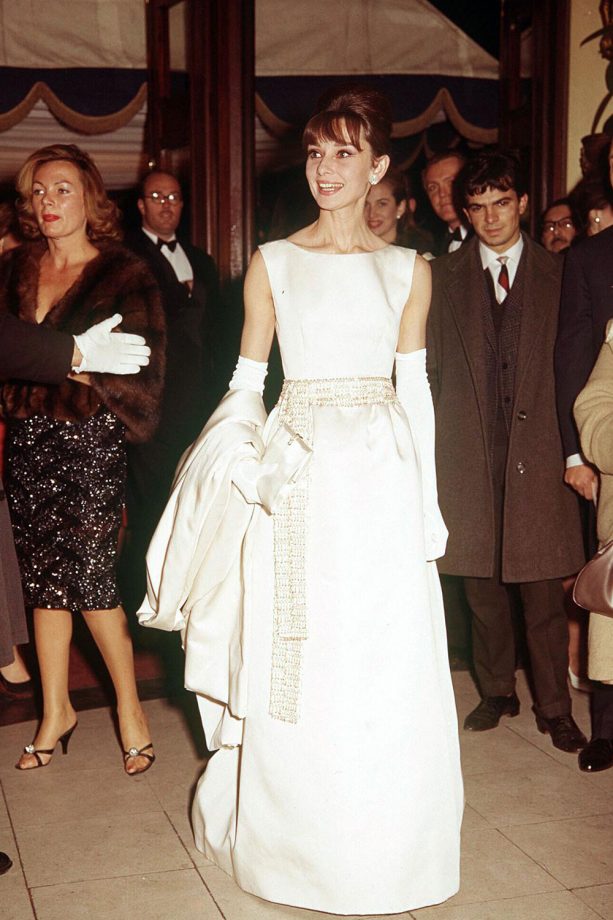 Audrey Hepburn Matches Her Whitel Gloves To Her Gown To An Event In The 1960's