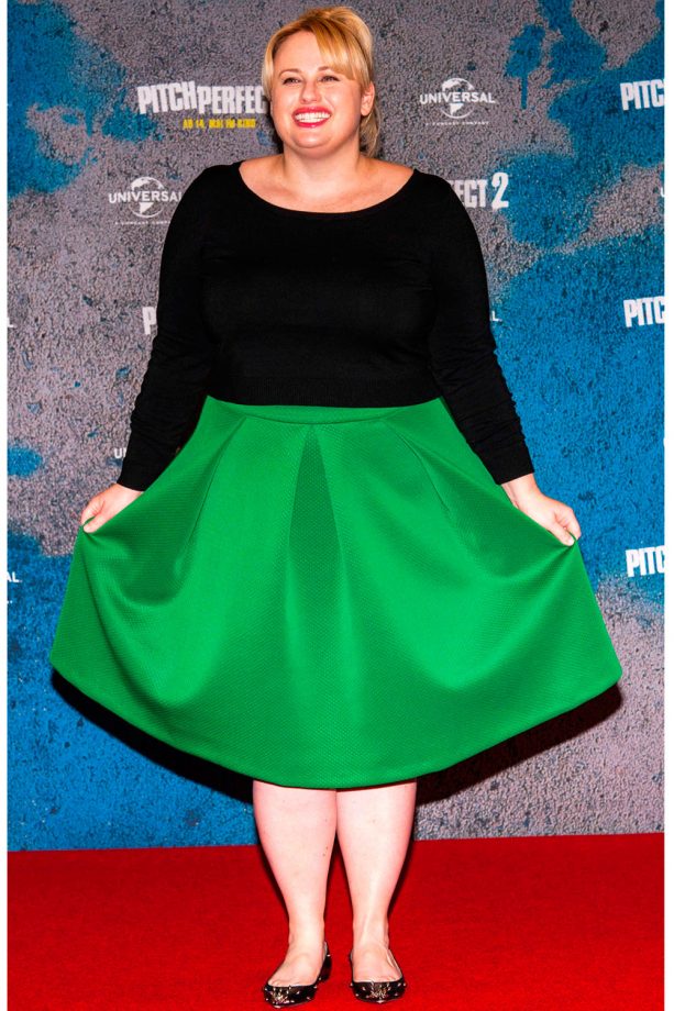 Rebel Wilson Brings Some Colour To The Red Carpet In This Green Midi Skirt At The 'Pitch Perfect 2' Photocall in Berlin, 2015
