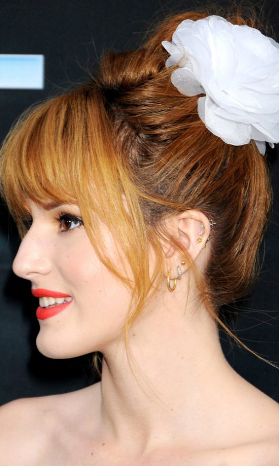 Festival Hairstyle: Bella Thorne Gives her Hairstyle A Boho Update With A Flower Accessory, 2013